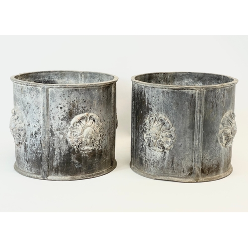 34 - A pair of late 19th/early 20th century heavy lead planters, with English Rose decoration. 35x30cm