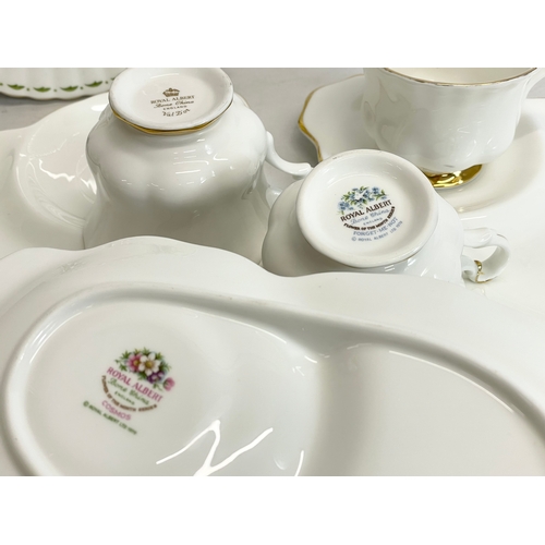 407 - A quantity of Royal Albert tea ware. Flower of the Month Snowdrops January, Flower of the Month Forg... 