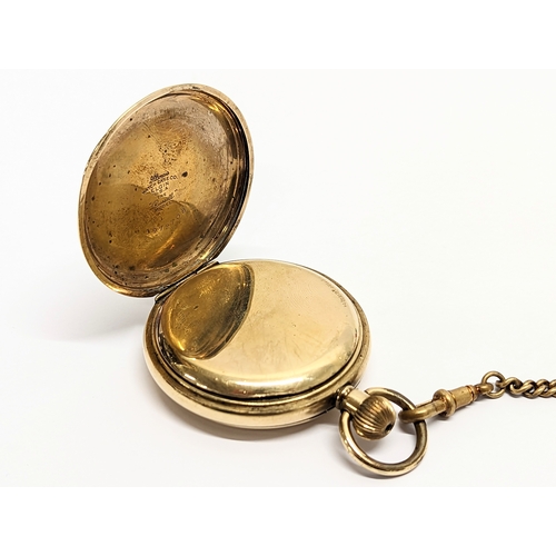 559 - A rolled gold Full Hunter pocket watch and chain by Elgin USA