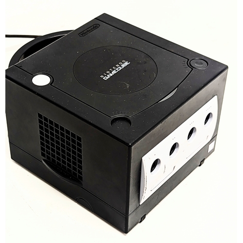 135 - A Nintendo GameCube console with 4 games, including Medal of Honour: Frontline, BurnOut, EA Sports F... 