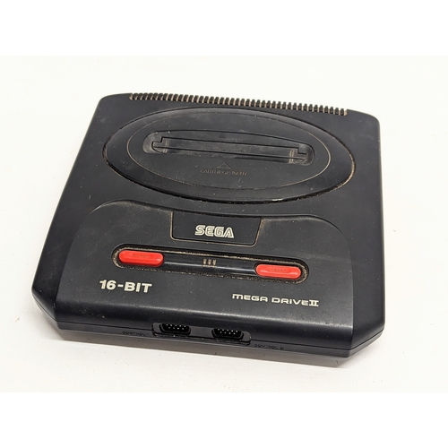 136 - A vintage SEGA Mega Drive II game console. Model number MK-1631-50