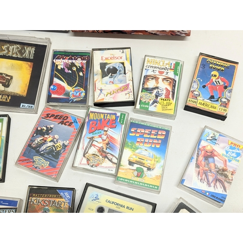 137 - A quantity of vintage Atari and Commodore games, etc, including Diamond Edge Manual (Disk Diagnostic... 