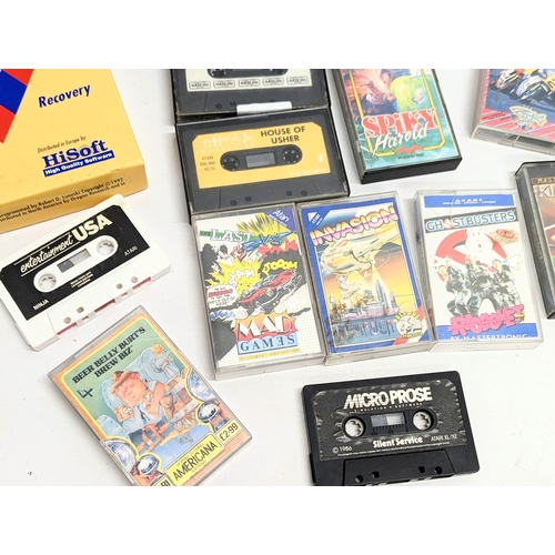 137 - A quantity of vintage Atari and Commodore games, etc, including Diamond Edge Manual (Disk Diagnostic... 