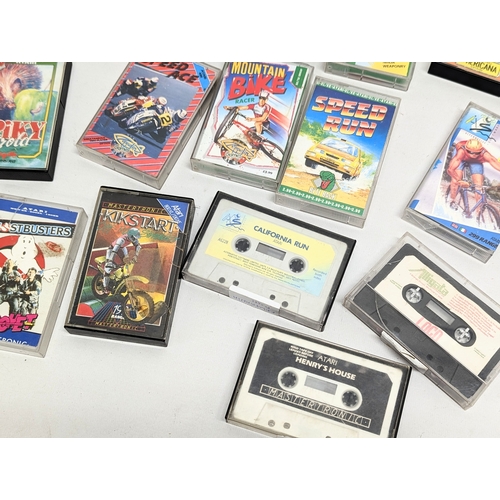 137 - A quantity of vintage Atari and Commodore games, etc, including Diamond Edge Manual (Disk Diagnostic... 