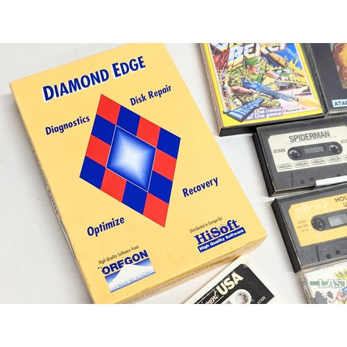 137 - A quantity of vintage Atari and Commodore games, etc, including Diamond Edge Manual (Disk Diagnostic... 