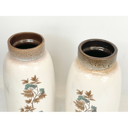 476 - A pair of West Germany Mid Century pottery vases. 38cm