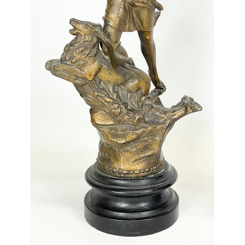 63 - A pair of late 19th century Spelter figures on wooden bases. 49cm