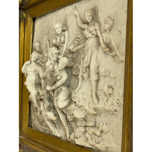 72 - An ornate framed wall plaque depicting the Bacchic procession, by Martin Moreau 1868. Reproduction. ... 