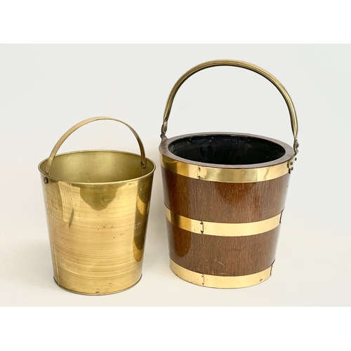 76 - An oak brass bound coal bucket, with brass double liner. 35x54cm including handle.