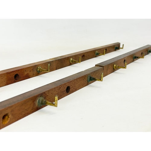 96 - 4 Victorian mahogany hat racks with brass hooks. 33.5cm each.