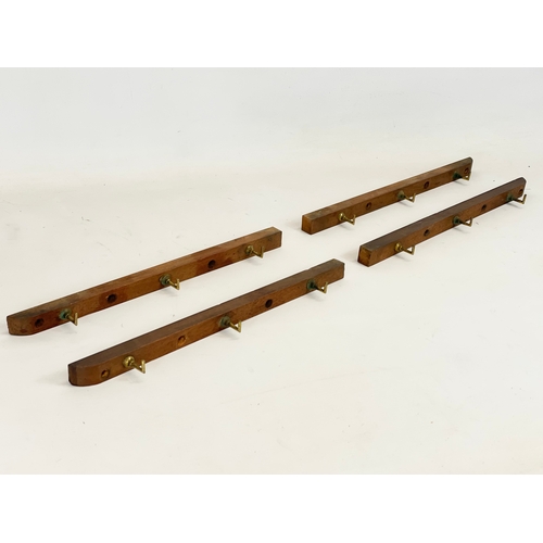 96 - 4 Victorian mahogany hat racks with brass hooks. 33.5cm each.