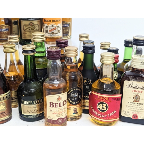 97 - A quantity of mostly unopened alcohol miniatures, including Johnnie Walker Black Label Scotch Whisky... 