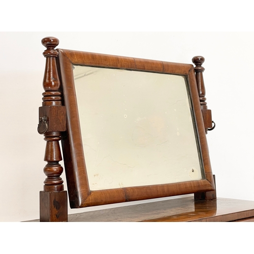 100 - An early Victorian mahogany dressing mirror with 2 drawers. 46x24x41cm