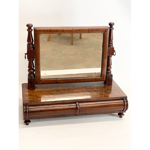 100 - An early Victorian mahogany dressing mirror with 2 drawers. 46x24x41cm