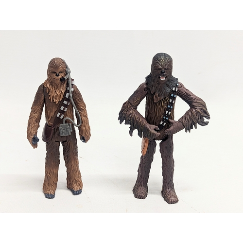 149 - A collection of Star Wars figures, including Hans Solo, Darth Vader, Chewbacca, R2-D2, C-3PO, Obi wa... 