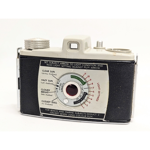 152 - A vintage Zenit-B 35mm camera, made in USSR in original case with strap. With a 1955 Kodak 'Bantam' ... 