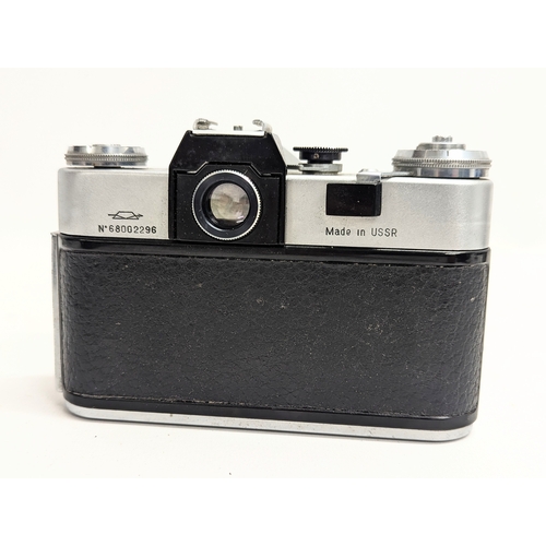 152 - A vintage Zenit-B 35mm camera, made in USSR in original case with strap. With a 1955 Kodak 'Bantam' ... 