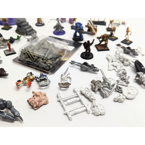 156 - A quantity of models including WarHammer