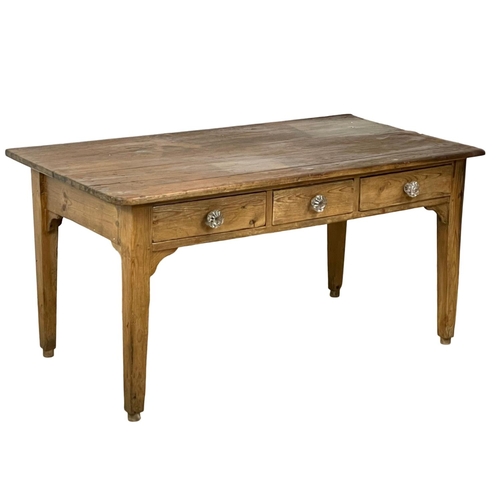 919 - A Victorian pine Farmhouse kitchen table with 3 drawers and Victorian glass handles. 160x87x80cm