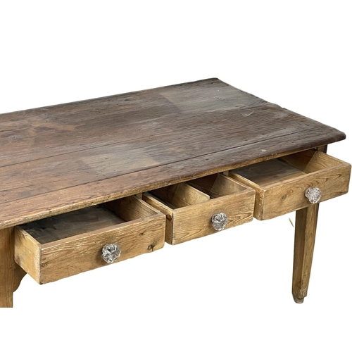 919 - A Victorian pine Farmhouse kitchen table with 3 drawers and Victorian glass handles. 160x87x80cm