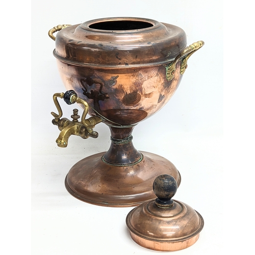 197 - A Victorian copper dispenser. 26x32cm