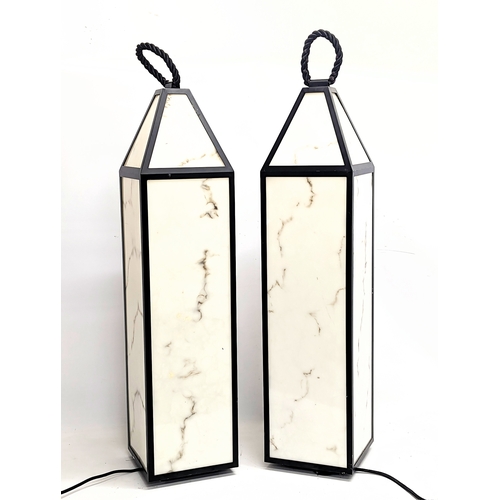 79 - A pair of tall Eichholtz lamps. 105cm