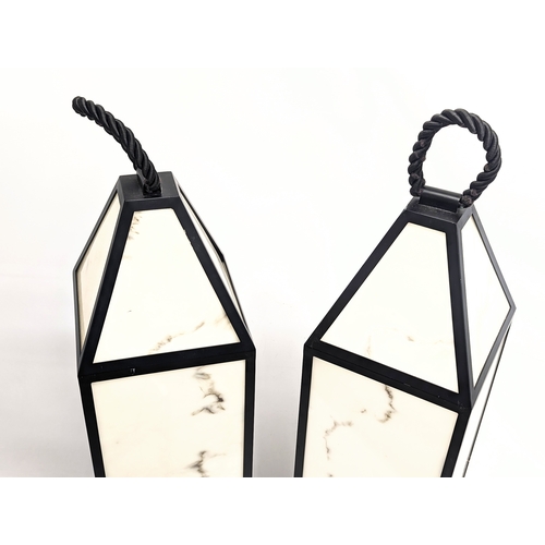 79 - A pair of tall Eichholtz lamps. 105cm