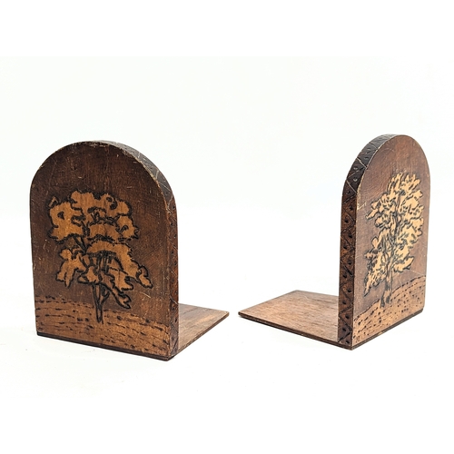 117 - A pair of vintage bookends with pokerwork decoration