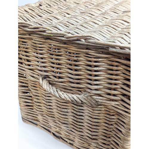 377 - A vintage heavy wicker basket. 59.5x40x36.5cm