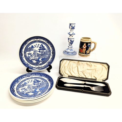 720 - A sundry lot including 4 Biltons pottery plates, pottery candlestick, Swiss stein, etc