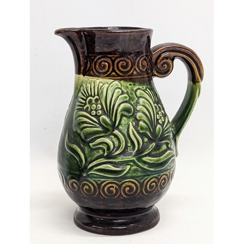 423 - 2 pieces of Mid Century West German pottery, including vase and jug. Jug measures 17.5cm