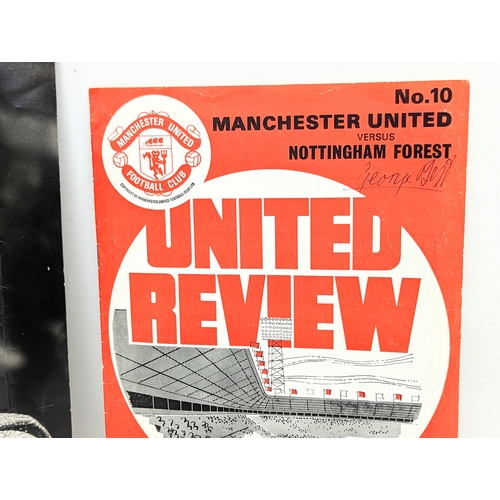 166 - A 1971 Manchester United Review programme signed by George Best, with photograph.