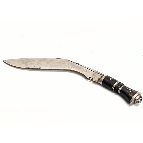 124 - A vintage Gurkhas' kukri in sheath