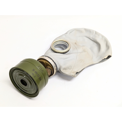 126 - A vintage Soviet gas mask, etc