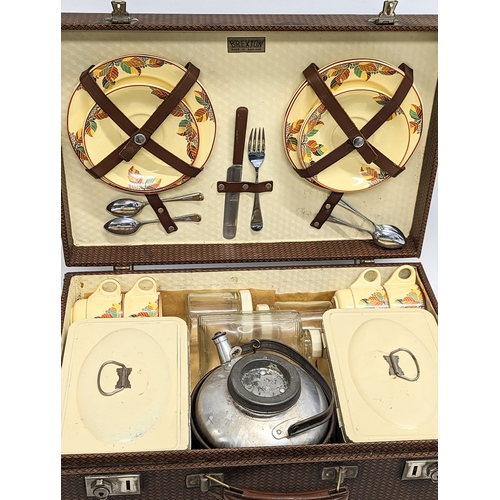 128 - A vintage Brexton picnic set in case