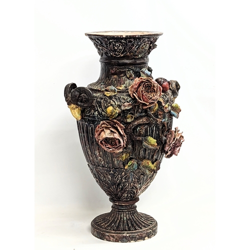 424 - A large late 19th century Barbotine Majolica pottery vase with roses and rams head decorations. 72.5... 