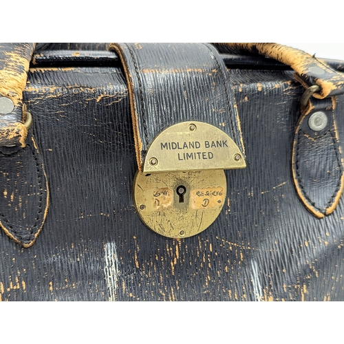 213 - An early 20th century bankers bag, engraved 