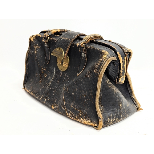 213 - An early 20th century bankers bag, engraved 