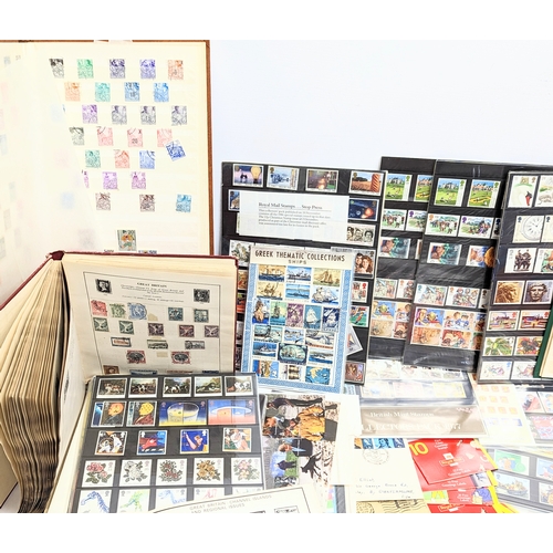 586 - A large quantity of vintage stamps, badges, stamp albums, bank notes