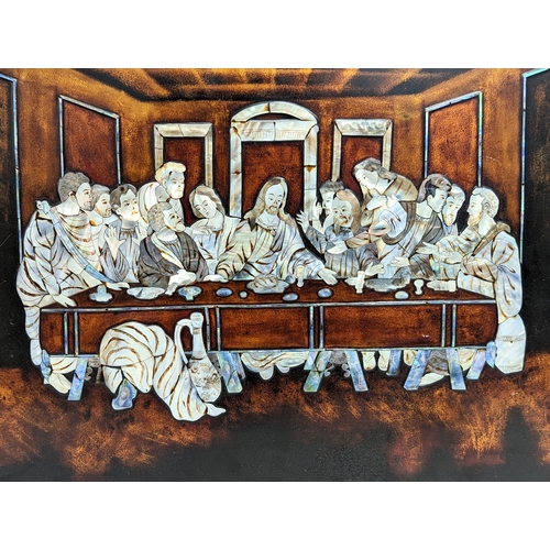 219 - A plaque with Mother of Pearl inlay of The Last Supper. 60.5x43cm