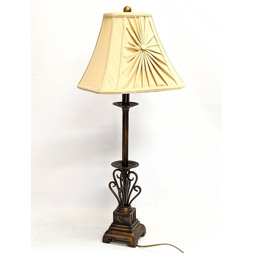 722 - A tall ornate table lamp. 81.5cm