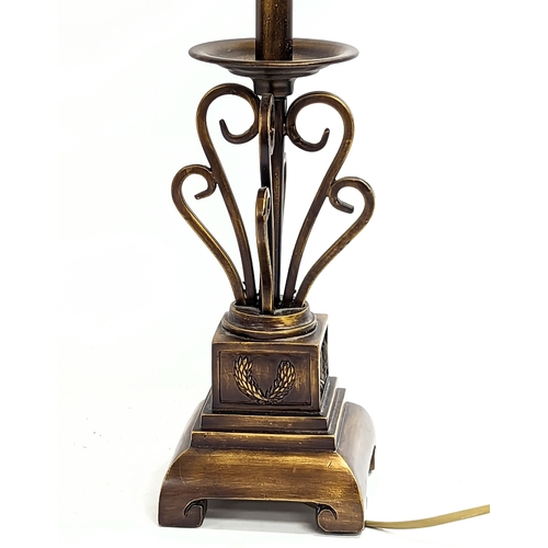 722 - A tall ornate table lamp. 81.5cm