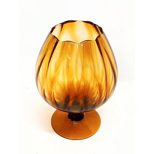 723 - An amber glass vase. 29cm