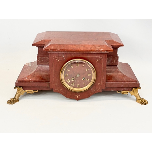 220 - A large Victorian slate mantle clock, with brass paw feet. Including pendulum and key. 49x25x20.5cm