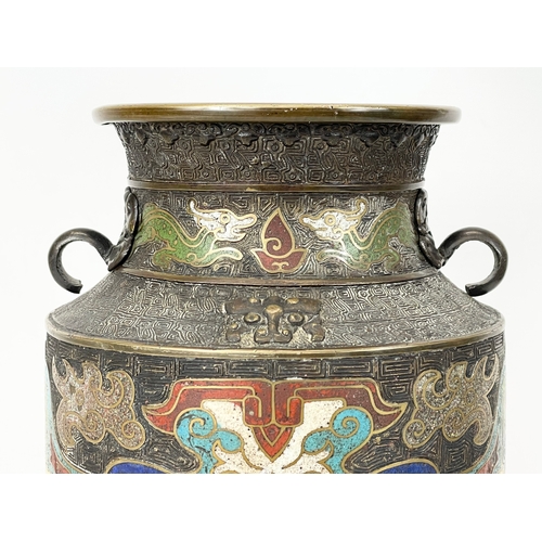 222 - A 19th century Chinese bronze and cloisonné vase, with wooden base. 26cm