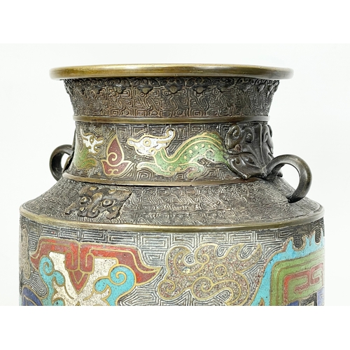 222 - A 19th century Chinese bronze and cloisonné vase, with wooden base. 26cm