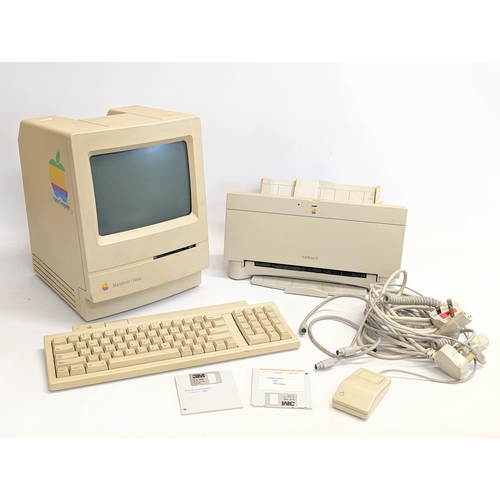 171 - A 1991 Apple Macintosh Classic computer, model M0420, Apple Keyboard II model M0487, Apple Desktop B... 