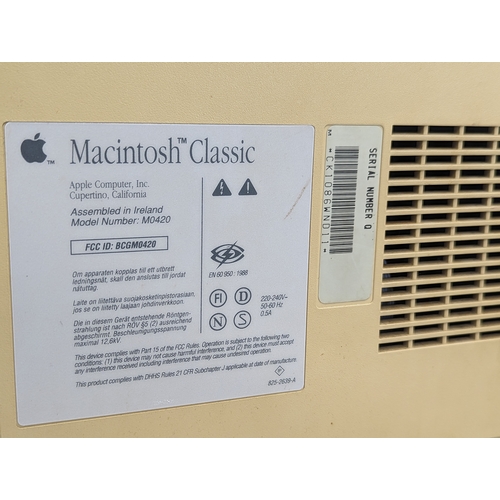 171 - A 1991 Apple Macintosh Classic computer, model M0420, Apple Keyboard II model M0487, Apple Desktop B... 