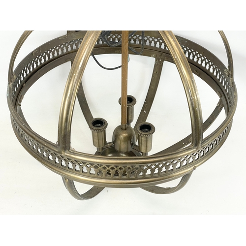 242 - A large brass light fitting. 46x65cm