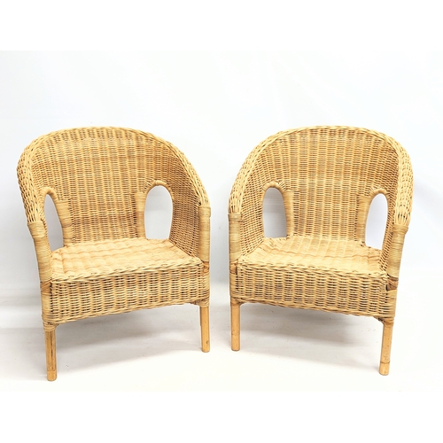 262 - A pair of child's wicker chairs. 46x46x55cm